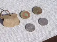 merc_roos_dogtag.webp