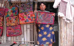 KunaWomanWithMolas.webp