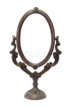 4794286-435325-an-old-ornate-mirror.jpg