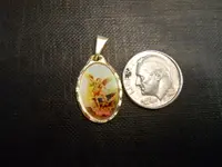 gold religous medal.webp