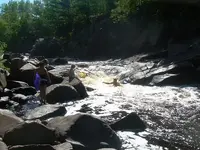 going to tube the rapids.webp