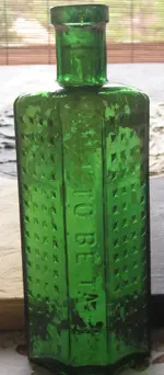 POISON COFFIN GREEN BOTTLE .webp