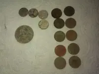 4 dimes and tokens.webp