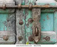 stock-photo-antique-door-with-chipped-blue-paint-and-rusted-lock-86137291.webp