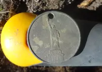 liberty token dirty.webp