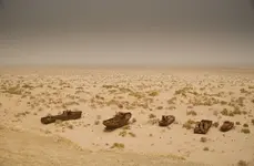 Moynaq_Uzbekistan_ships_sitting_in_desert.webp