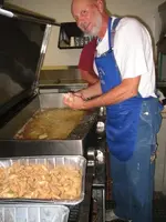 Frying the catfish.webp