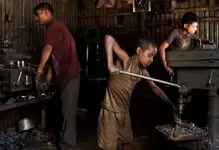 young-laborer-makes-metal-components-bangladesh-factory-.webp
