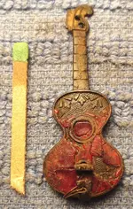 12 TV7 110114 Guitar Pin.webp