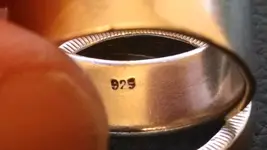 Close up silver ring.webp