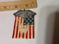 calvary badge.webp