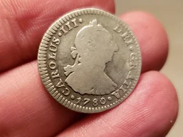 A new colonial spot gives me French and multiple Spanish silver coins.