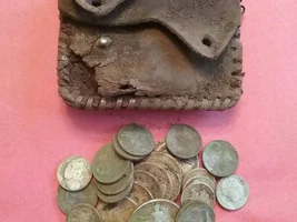 Dug a change purse full of silver!!!