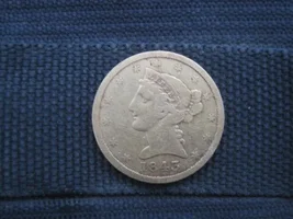 Searching for Sharps rifle parts nets another GOLD coin!