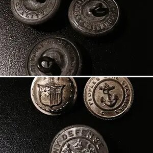 Three old buttons...