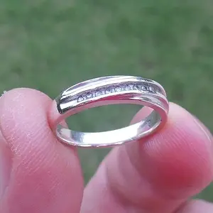 Sterling wedding band....real diamonds