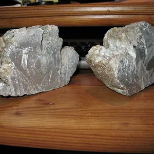 Same rock, but cut in half, albeit very badly. I will eventually grind and polish the surface.