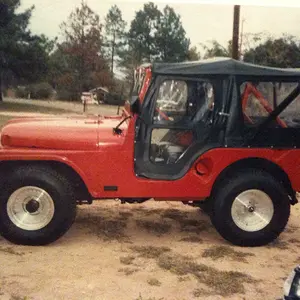 1991 - Troy, AL - My 1955 Willys Jeep after some upgrading. Added a fuse panel, electric wipers, soft top, new paint, recovered seats, carpeting, Cent