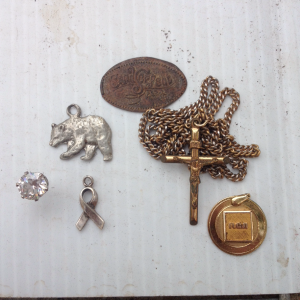 .925 bear and ribbon charm, 1/20 12k gf RCA gold record medallion, 1/20 14k gf religious cross and chain.