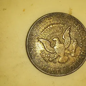 back of kenedy half dollar