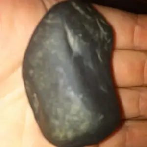 Metallic yet stoney look surface when uncleaned the lump is NOT visible.