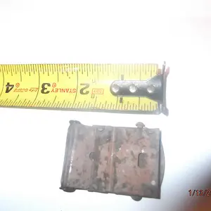 bottom side of belt buckle only markings "SOLID BRASS"