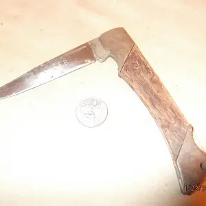 only markings on the knife "STEER" dated to be late 70's early 80's