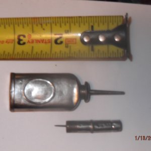 Oil dropper for old sewing machine.