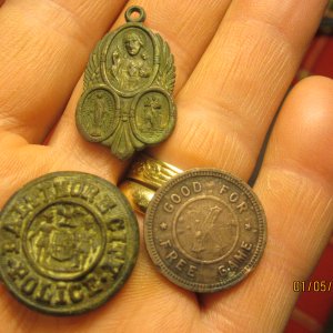 Medallion, button and 1930's slot token