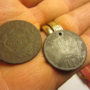 Large cent and Bond Bread token