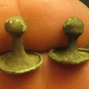 Game pieces? or cuff buttons?