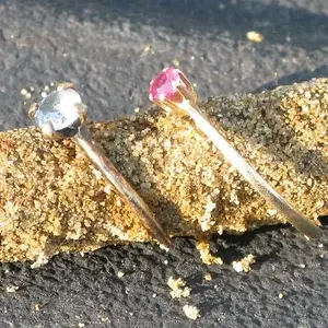 4-14-13 The Ruby stoned ring on the right had been lost for 29 years. Great return.