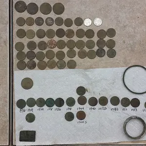 20150607 163140  Old VFW  Hr  Brass or Copper bracelet, 1941 Merc,  1956-D Rosie, 17 wheats 1916-58.  Elms rental.  $2.68