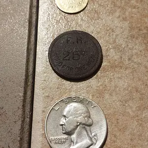 20150706 155438  3 Notables
Henny Penny, F.R. 25 cent Good for one meal token, and 1953 quarter