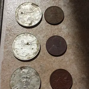 20150718 160932  House by Catholic church Noatables.  3 Shell Oil Co tokens, 2 wheats 1946 & 1954-D