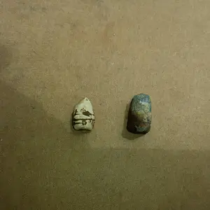 20150822 A closeup of a CW colt pistol bullet and a modern bullet. Both found where a Civil War Confederate hospital used to be with the F75.