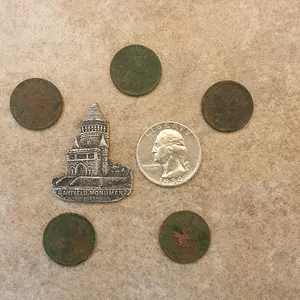 20150907 165601  Notables  1954 quarter, 5 wheats 1909, 15, 20 x 2, & 25.  Garfield Monument sovenier