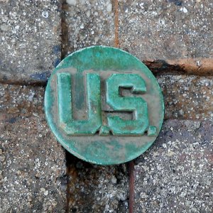 Dug this U.S. brass collar disk in Oct. 2015 used from 1937-45 in an area where army maneuvers were conducted in middle Tennessee during WW2.