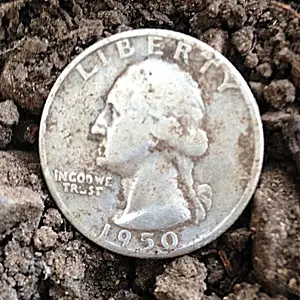 1950 Silver Quarter found in an old athletic field.