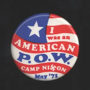 "I Was an American P.O.W., Camp Nixon, May '71"  1.75"
 Curl: "War Resisters League NYC."
 Issued for 1971 Vietnam protests that were intended to shut