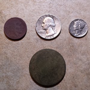 20151127 182020  Notables from curb strip by cemetery.  1927 Buffalo, 1944 Quarter, 1935 Merc, &  Bronze disk