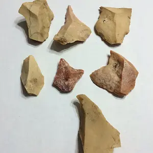 Flakes with curious lines that form triangle. Natural cleaving?
from large outcropping. 
Hermann, MO
