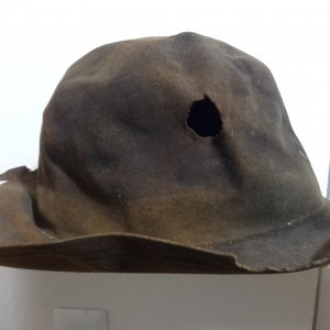 hat with hole, 1890's Leadville privy