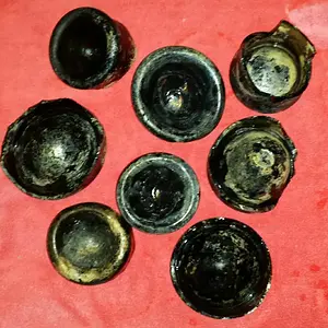 Black glass bottle shards