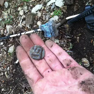 Collar pin in a ditch