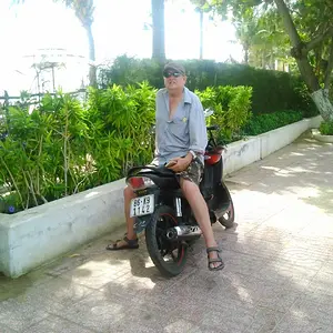 relaxing on my motorbike near the beach