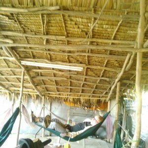 resting in a hammock at a coffee shop in the Mekong Delta