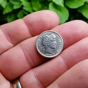 1909 S found in yard of 1900 built residence.