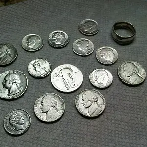 Assorted cleaned  silvers found during last few hunts.