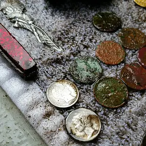 Barber Dime and assorted finds after a hunt.